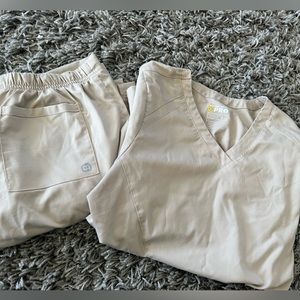 Tan, small, wonder wink scrubs regular